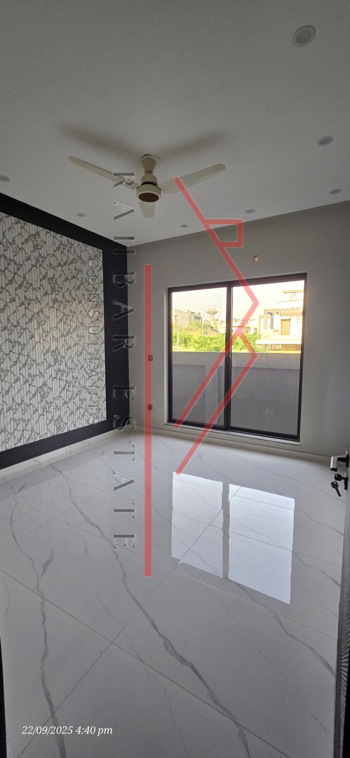 Prime Location 10 Marla House – Front View alt="Drawing room and TV lounge in 10 Marla House Bahria"