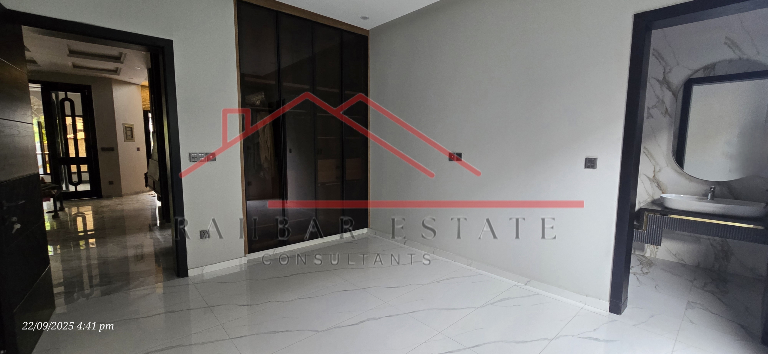 Bedrooms with Attached Bathrooms – 10 Marla Bahria Home alt="Modern kitchen with dirty kitchen and laundry Bahria Town"