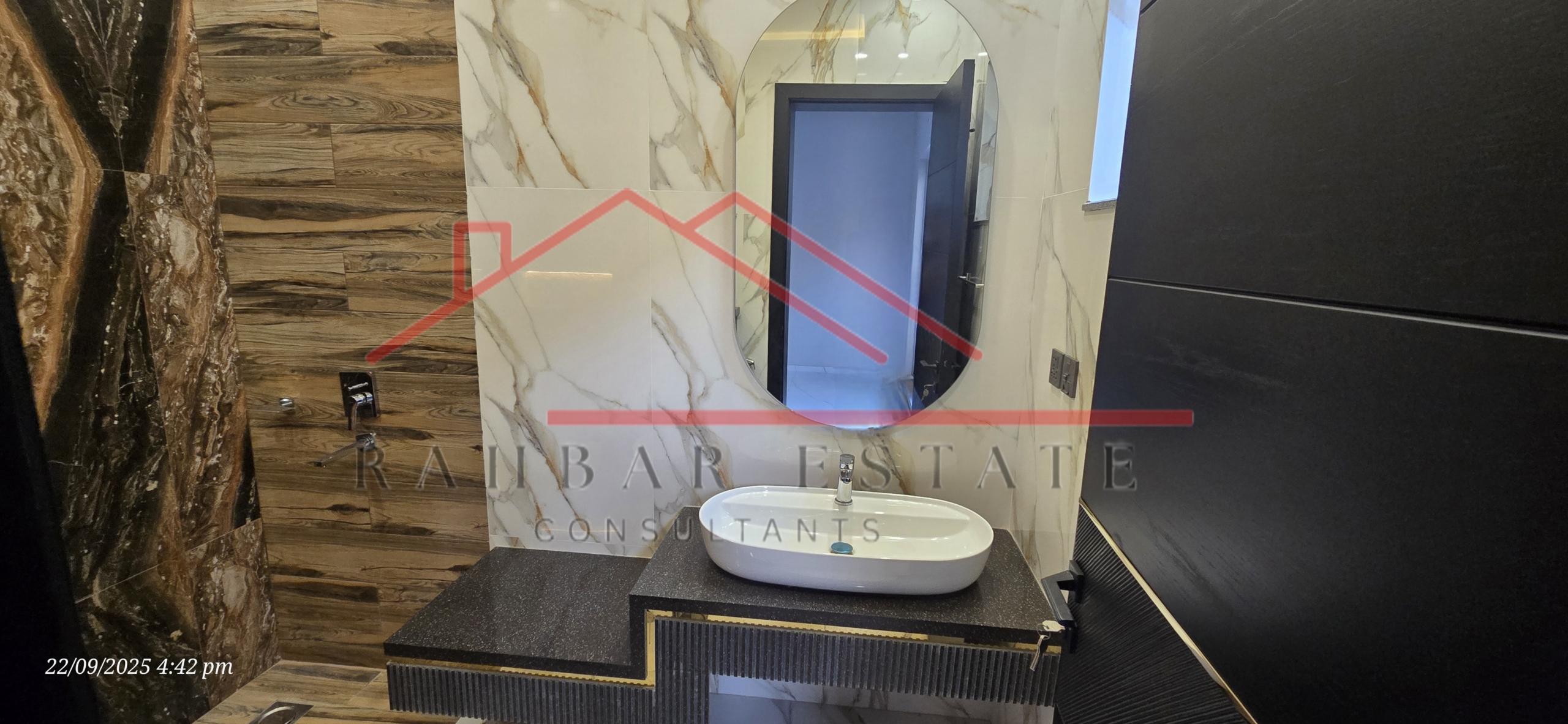 Prime Location 10 Marla House – Front View alt="Servant quarter and storage room on rooftop Bahria Town house"