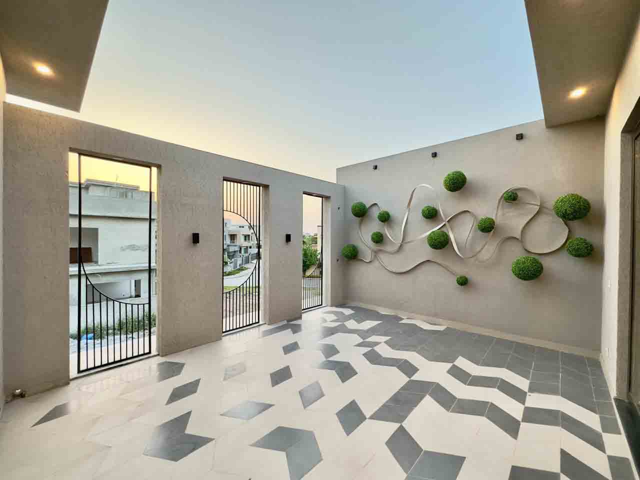 Experience modern luxury and timeless design with this 1 Kanal Designer House in DHA Phase 2, Block B. Situated in one of Islamabad’s most prestigious residential sectors, this home blends elegance, comfort, and functionality. The property features a beautiful front lawn and a car porch with parking for two vehicles, ensuring convenience and style. Inside, you’ll find a spacious drawing room, formal dining area, and an inviting TV lounge designed for relaxation and family gatherings. The modern kitchen comes with a separate dirty kitchen, allowing easy meal preparation and entertaining. Other features include a powder room, laundry room, and a cozy BBQ area — perfect for hosting outdoor dinners and weekend get-togethers. High-quality finishes, premium fittings, and designer architecture make this home truly stand out in DHA Phase 2. With its prime location in Block B, this property ensures easy access to schools, markets, parks, and main roads. Whether you’re looking to live or invest, this 1 Kanal Designer House in DHA Phase 2 offers long-term value, comfort, and prestige. Contact Rahbar Estate Consultants today to schedule your visit and make this dream home yours.