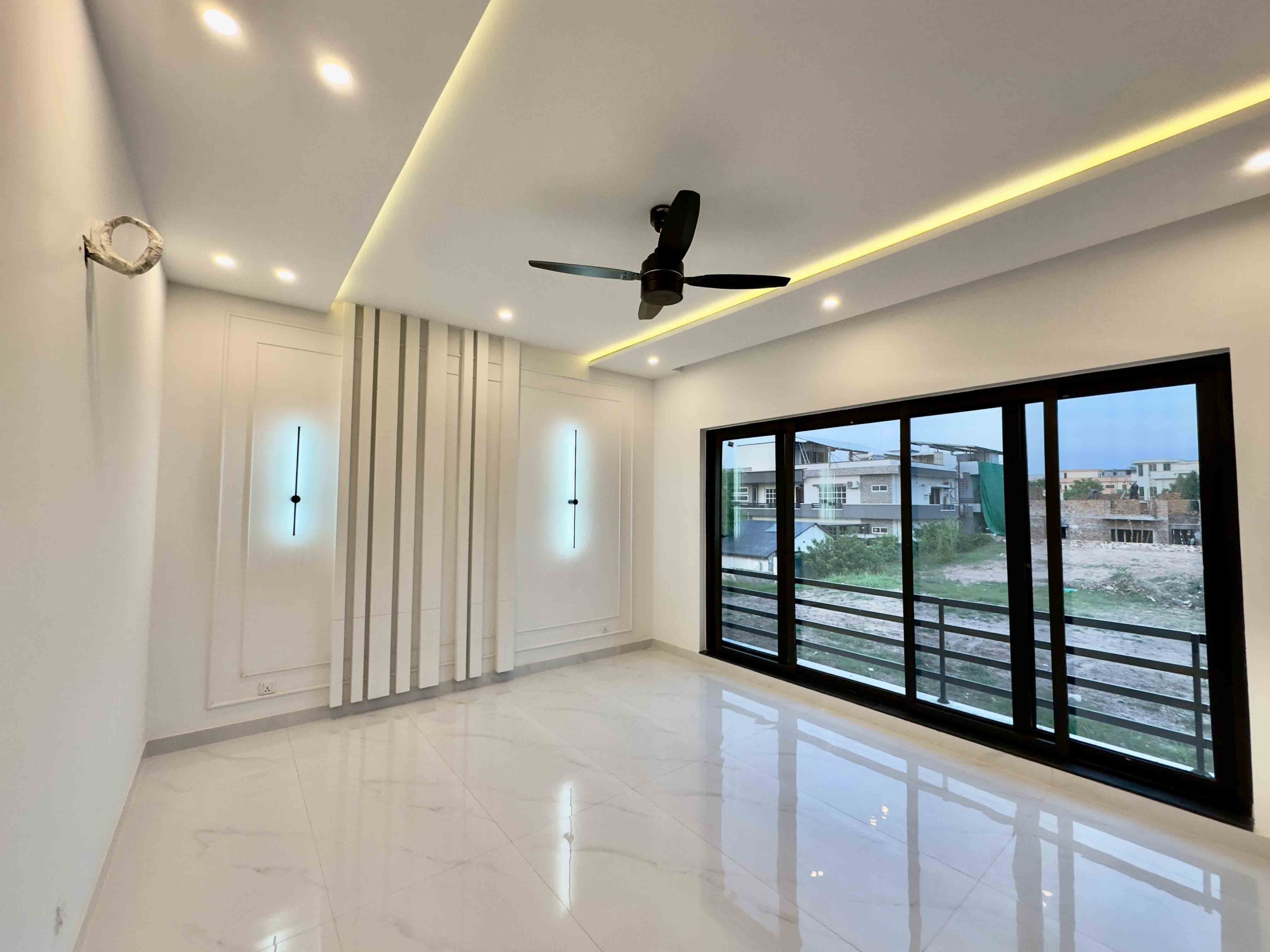1 Kanal designer house in DHA Phase 2 Block B with lawn and 2-car porch