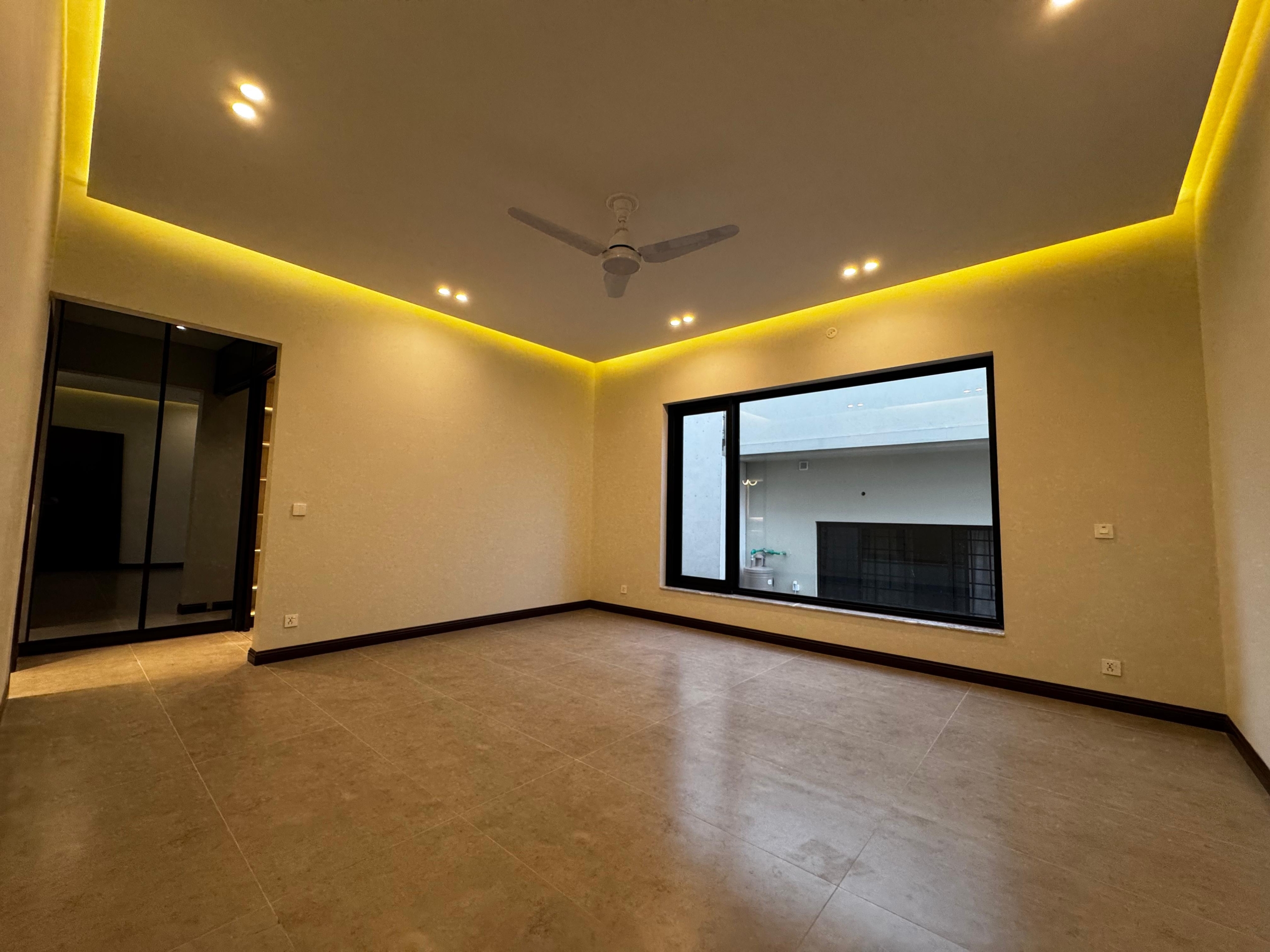 Spacious DHA Phase 2 home with BBQ area, TV lounge, and modern kitchen