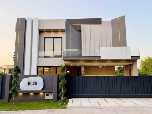 1 Kanal designer house in DHA Phase 2 Block B with lawn and 2-car porch