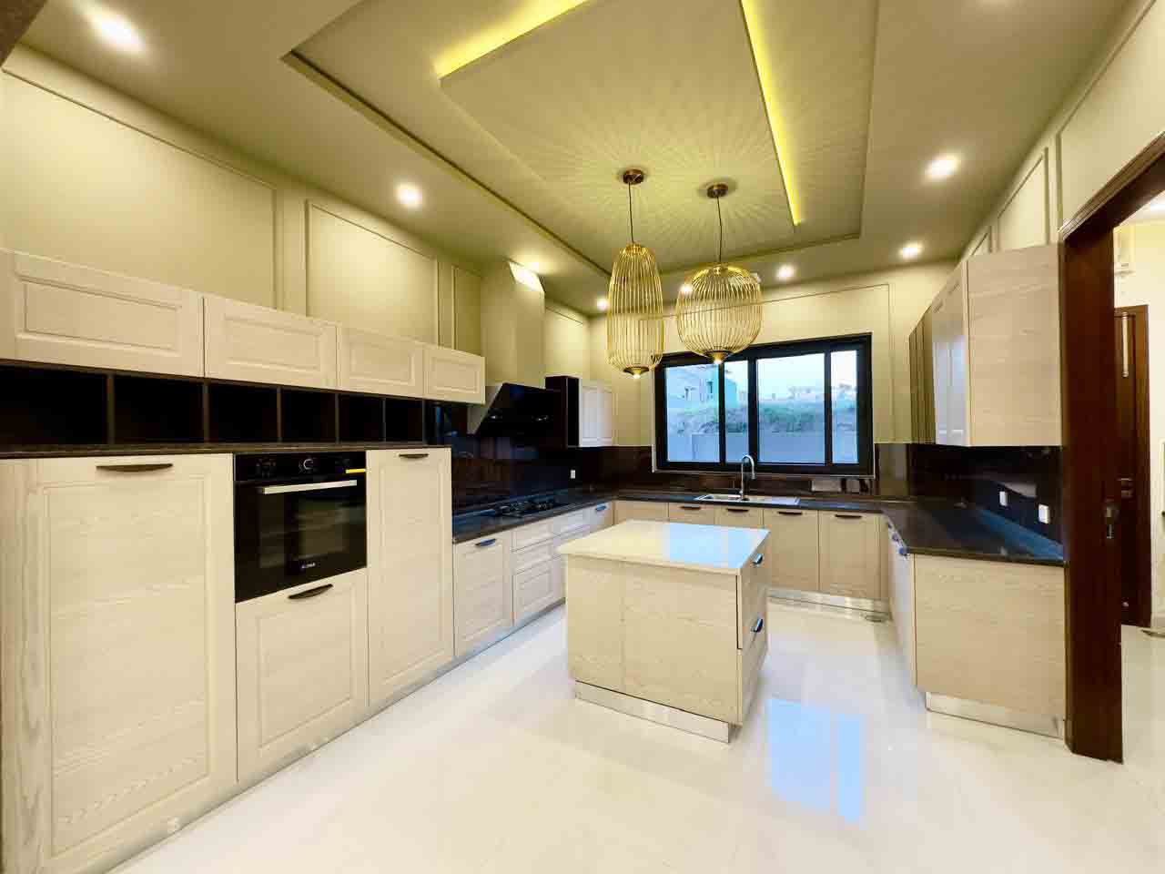 1 Kanal designer house in DHA Phase 2 Block B with lawn and 2-car porch