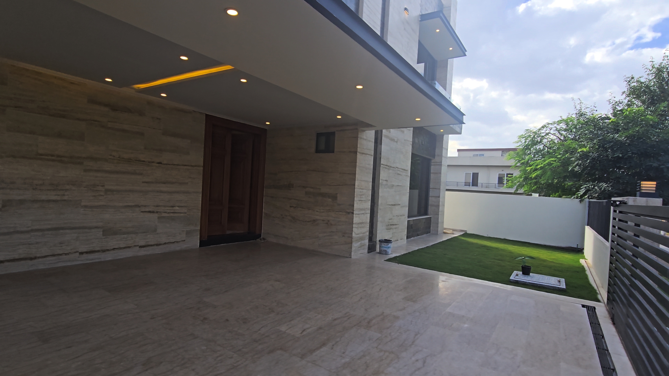 1 Kanal designer house in DHA Phase 2 Block B with lawn and 2-car porch