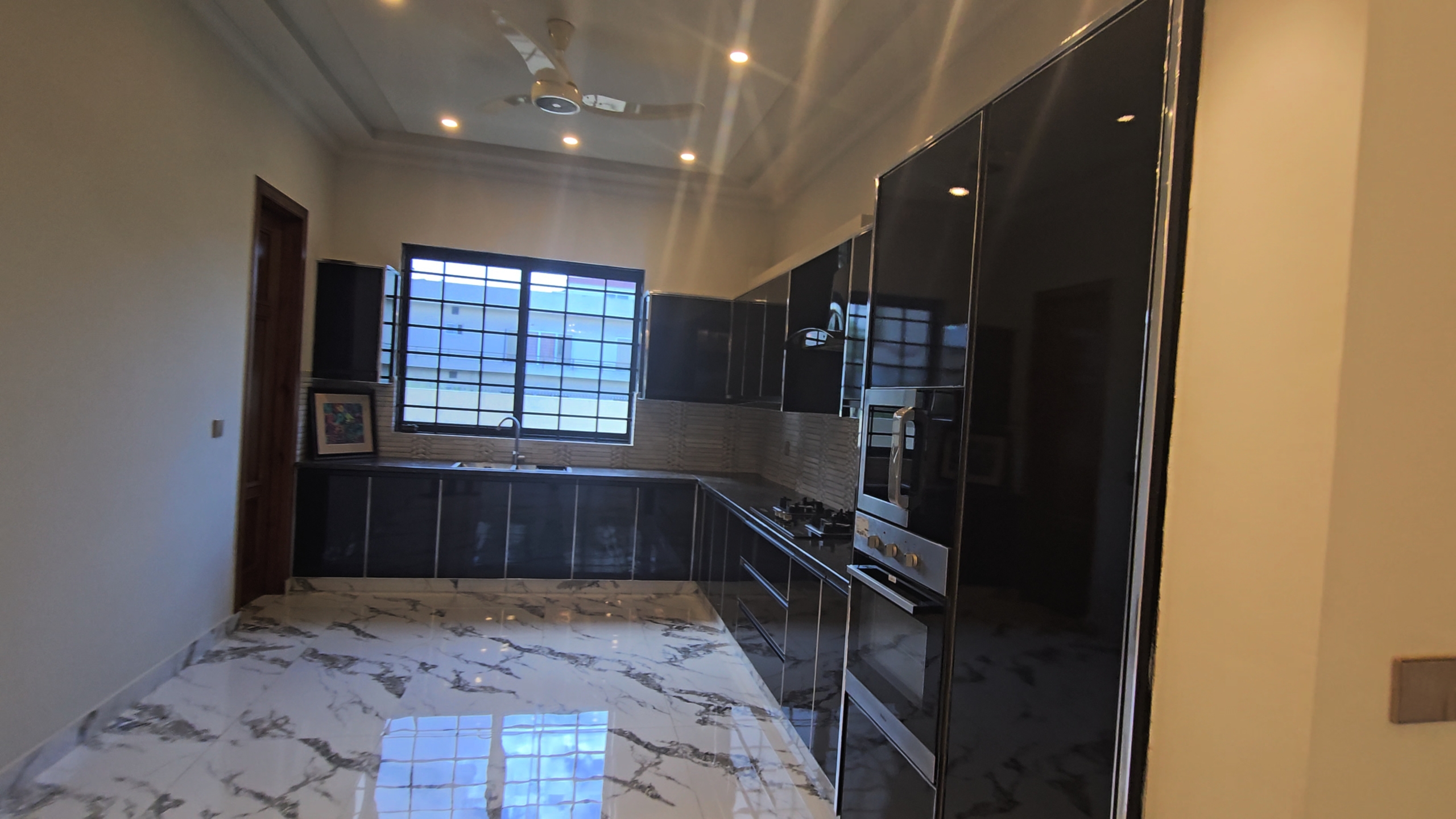 1 Kanal designer house in DHA Phase 2 Block B with lawn and 2-car porch