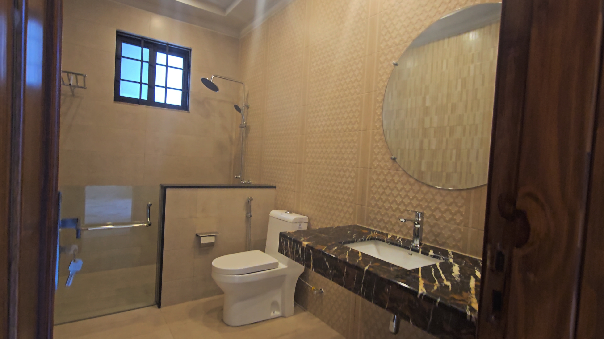 1 Kanal designer house in DHA Phase 2 Block B with lawn and 2-car porch