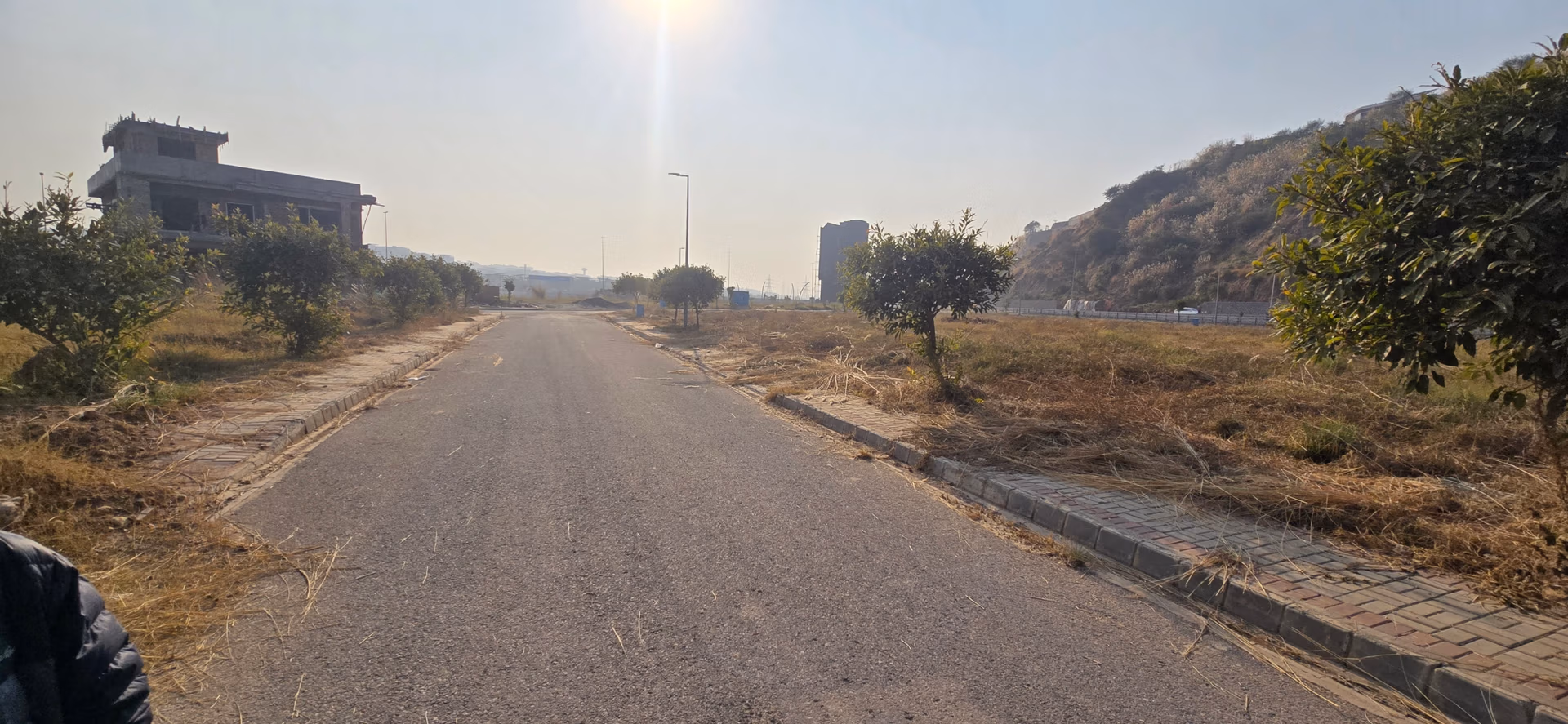 Alt Text: Peaceful residential neighbourhood in DHA Phase 4