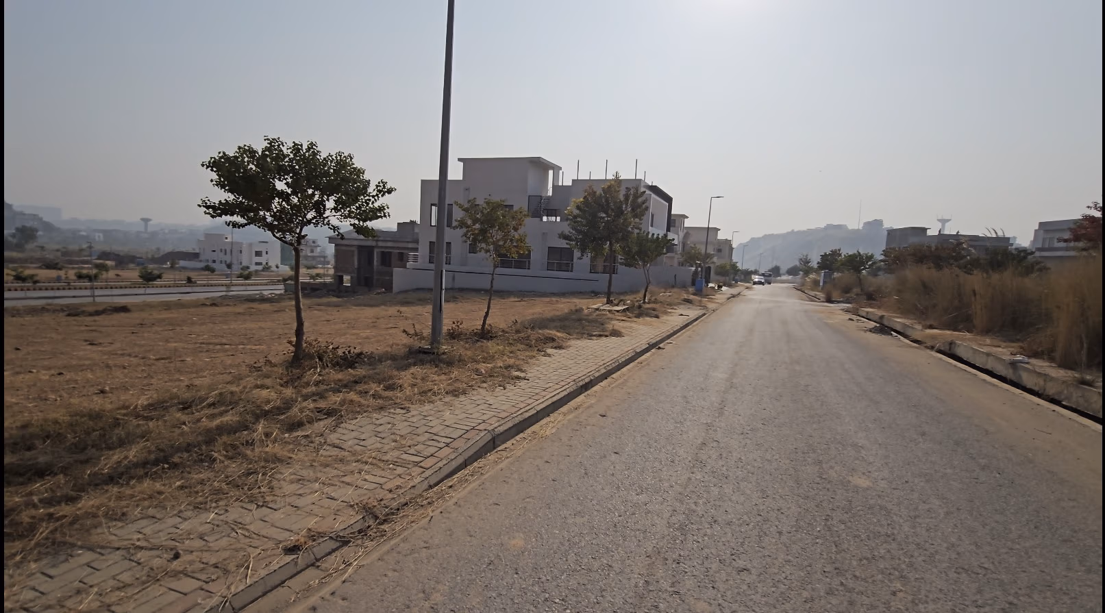 Alt Text: Peaceful residential neighbourhood in DHA Phase 4